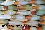 AGAT288 15 inches 10*30mm faceted rice rainbow agate beads