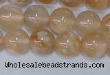 CAA1073 15.5 inches 10mm round sakura agate gemstone beads