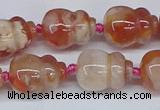 CAA1183 15.5 inches 15*20mm carved calabash sakura agate beads