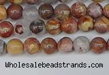 CAA1220 15.5 inches 4mm round gold mountain agate beads