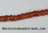 CAA142 15.5 inches 6*8mm bamboo shape red agate gemstone beads