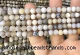 CAA3587 15.5 inches 6mm round matte ocean fossil agate beads