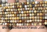 CAA4933 15.5 inches 4mm round yellow crazy lace agate beads wholesale