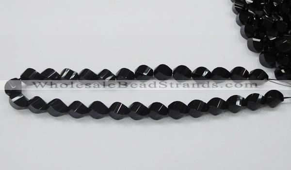 CAB336 15.5 inches 10*14mm faceted & twisted rice black agate beads