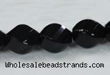 CAB337 15.5 inches 15*20mm faceted & twisted rice black agate beads