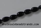 CAB744 15.5 inches 6*8mm flat teardrop black agate gemstone beads