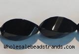 CAB797 15.5 inches 12*24mm faceted & twisted rice black agate beads