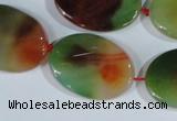 CAG1064 15.5 inches 22*30mm twisted oval rainbow agate beads