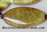 CAG1579 15.5 inches 20*40mm twisted oval fire crackle agate beads