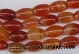 CAG1646 15.5 inches 8*12mm rice red agate gemstone beads