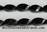 CAG4009 15.5 inches 8*16mm faceted & twisted rice black agate beads