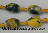 CAG5774 15 inches 10*14mm faceted rice fire crackle agate beads