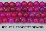 CAG9924 15.5 inches 4mm round fuchsia crazy lace agate beads