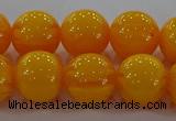 CAR404 15.5 inches 12mm round synthetic amber beads wholesale