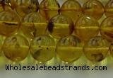 CAR523 15.5 inches 8mm - 9mm round natural amber beads wholesale