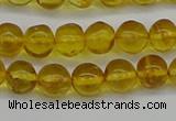 CAR551 15.5 inches 6mm - 7mm round natural amber beads wholesale