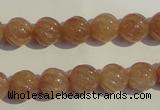 CBQ15 15.5 inches 10mm carved round strawberry quartz beads wholesale