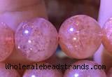 CBQ562 15.5 inches 12mm round golden strawberry quartz beads