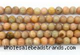 CCA553 15.5 inches 10mm round peach calcite gemstone beads