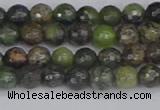 CCJ420 15.5 inches 4mm faceted round dendritic green jade beads