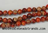 CDE491 15.5 inches 6mm round dyed sea sediment jasper beads