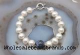 CFB1050 Hand-knotted 9mm - 10mm potato white freshwater pearl & sodalite bracelet