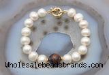 CFB1059 Hand-knotted 9mm - 10mm potato white freshwater pearl & mahogany obsidian bracelet