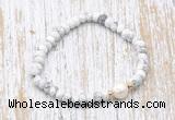 CFB700 faceted rondelle white howlite & potato white freshwater pearl stretchy bracelet