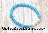 CFB704 faceted rondelle turquoise & potato white freshwater pearl stretchy bracelet