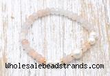 CFB711 faceted rondelle pink aventurine & potato white freshwater pearl stretchy bracelet