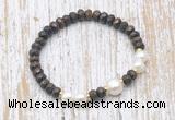 CFB756 faceted rondelle bronzite & potato white freshwater pearl stretchy bracelet