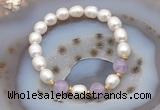 CFB903 9mm - 10mm rice white freshwater pearl & lavender amethyst stretchy bracelet