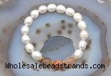 CFB913 9mm - 10mm rice white freshwater pearl & rainbow moonstone stretchy bracelet