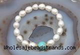 CFB926 9mm - 10mm rice white freshwater pearl & blue sea sediment jasper stretchy bracelet