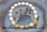 CFB928 9mm - 10mm rice white freshwater pearl & honey jade stretchy bracelet