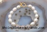 CFB934 Hand-knotted 9mm - 10mm rice white freshwater pearl & rose quartz bracelet