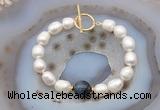 CFB979 Hand-knotted 9mm - 10mm rice white freshwater pearl & blue tiger eye bracelet