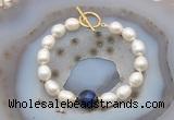 CFB980 Hand-knotted 9mm - 10mm rice white freshwater pearl & blue tiger eye bracelet