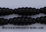 CFG760 15.5 inches 10*30mm carved rice black agate beads