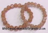 CGB4587 7.5 inches 8mm - 9mm round sunstone beaded bracelets