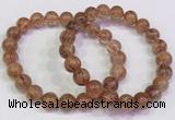 CGB4620 8mm - 9mm round golden rutilated quartz beaded bracelets