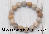 CGB5745 10mm, 12mm fossil coral beads with zircon ball charm bracelets