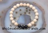 CGB6490 8mm round matte white fossil jasper & black lava beaded bracelets