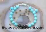 CGB6586 8mm round blue howlite & black lava adjustable bracelets