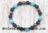 CGB8379 8mm blue howlite, black onyx & hematite energy bracelet