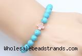 CGB9352 8mm, 10mm blue howlite & cross hematite power beads bracelets