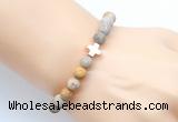 CGB9434 8mm, 10mm matte fossil coral & cross hematite power beads bracelets