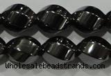 CHE166 15.5 inches 10*12mm twisted rice hematite beads