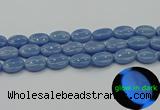 CLU143 15.5 inches 13*18mm oval blue luminous stone beads