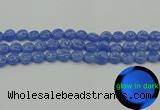 CLU171 15.5 inches 10mm flat round blue luminous stone beads